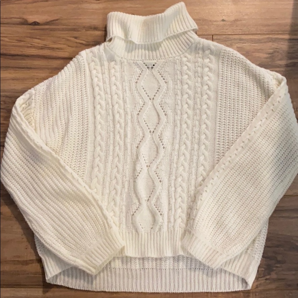 White knit turtle neck sweater